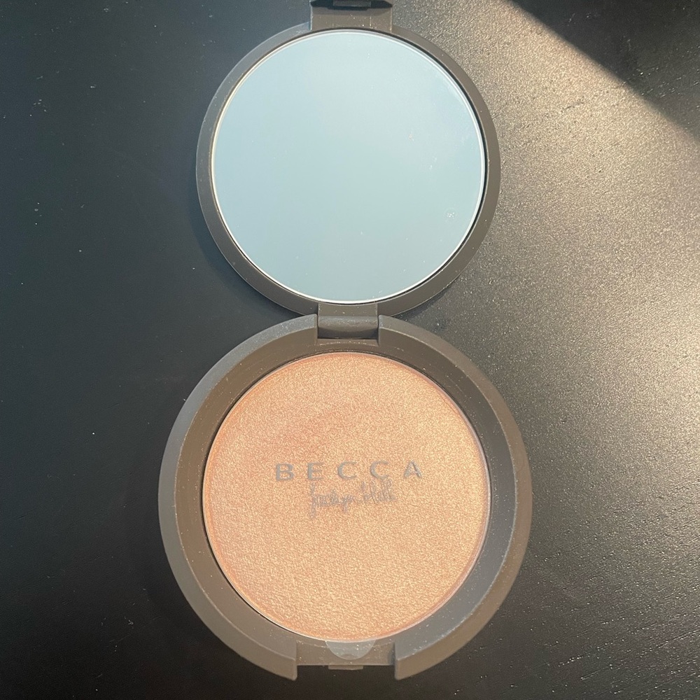 New Becca Champagne Pop highlighter